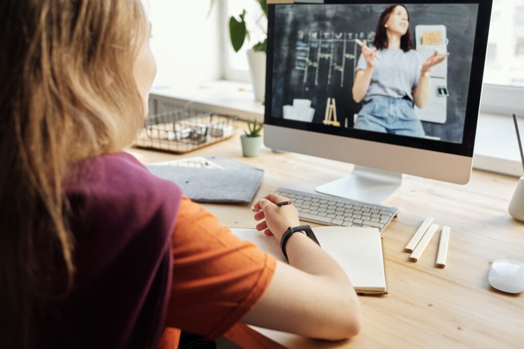 Photo by Julia M Cameron: https://www.pexels.com/photo/photo-of-girl-watching-through-imac-4144222/