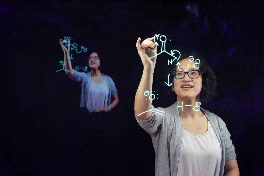 Catherine Chow (Chemistry Instructor) using Lightboard studio